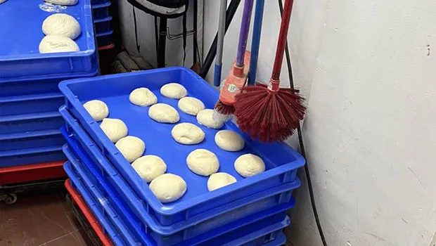 Domino's faces Twitterati’s wrath after photo of pizza dough kept below mop and toilet brush surfaces